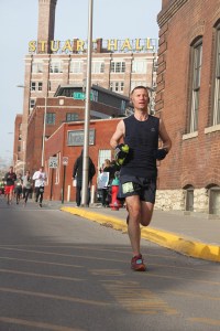 Running through the Crossroads Arts District around Mile 3 of the Great Plains 10K.